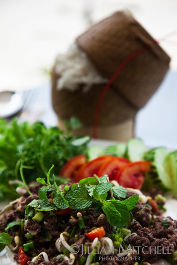 A fresh spicy dish of beef with been sprouts and herbs make a delicious take on this traditional Lao classic.