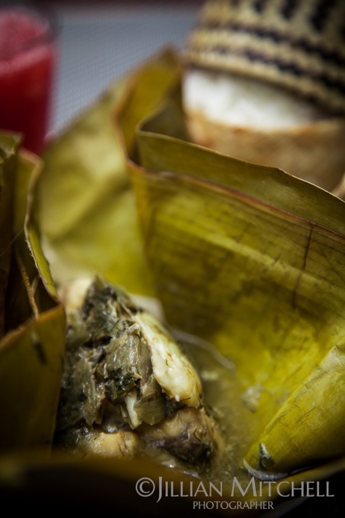Mok Pa - Fish steamed in a banana leaf with basil and dill with sticky rice.